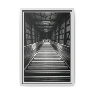 Industrial Automation Art Print Vertical black and white photography of a modern industrial conveyor system with rhythmic rollers and a deep vanishing point.